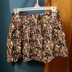 bebe flowered mini skirt